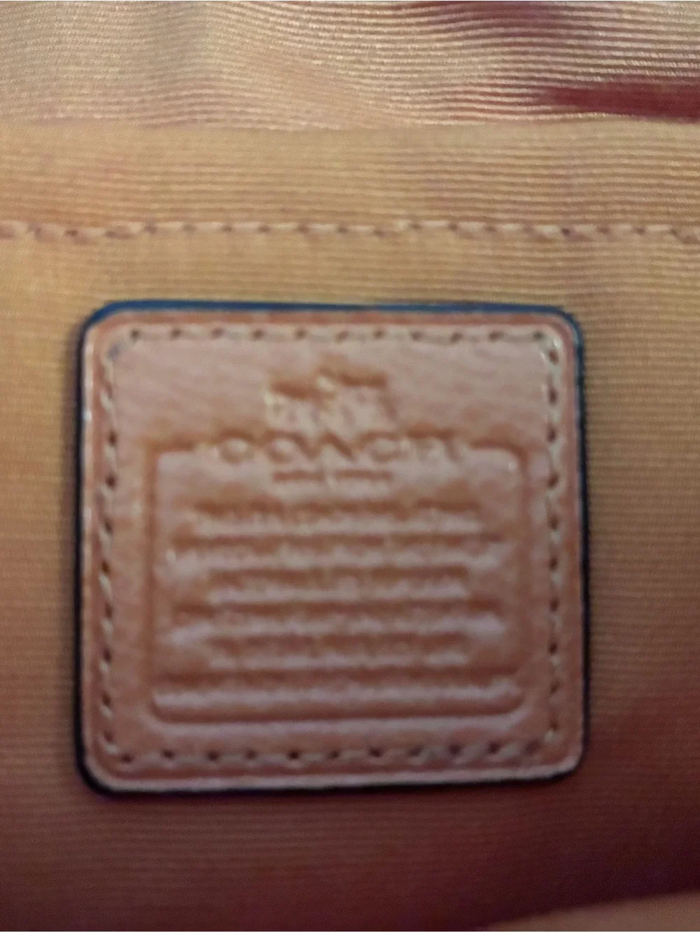Coach Red and Orange Leather Crossbody with Pink strap.